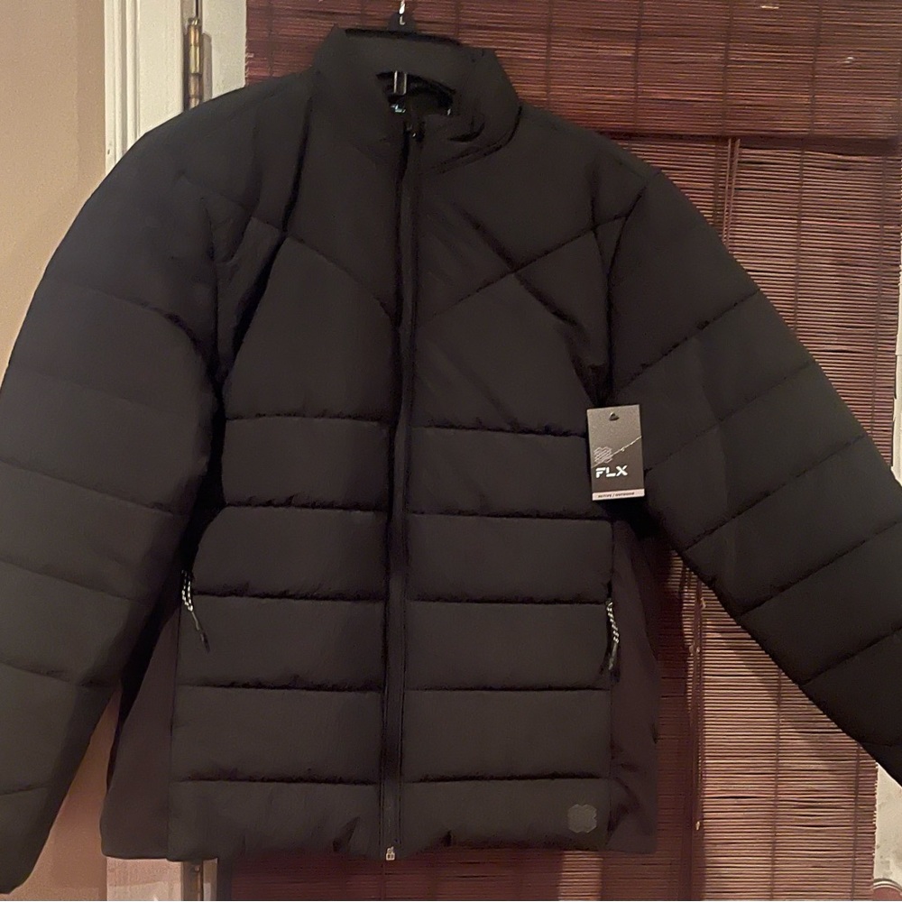 Black FLX Quilted jacket. Water and wind resistant.